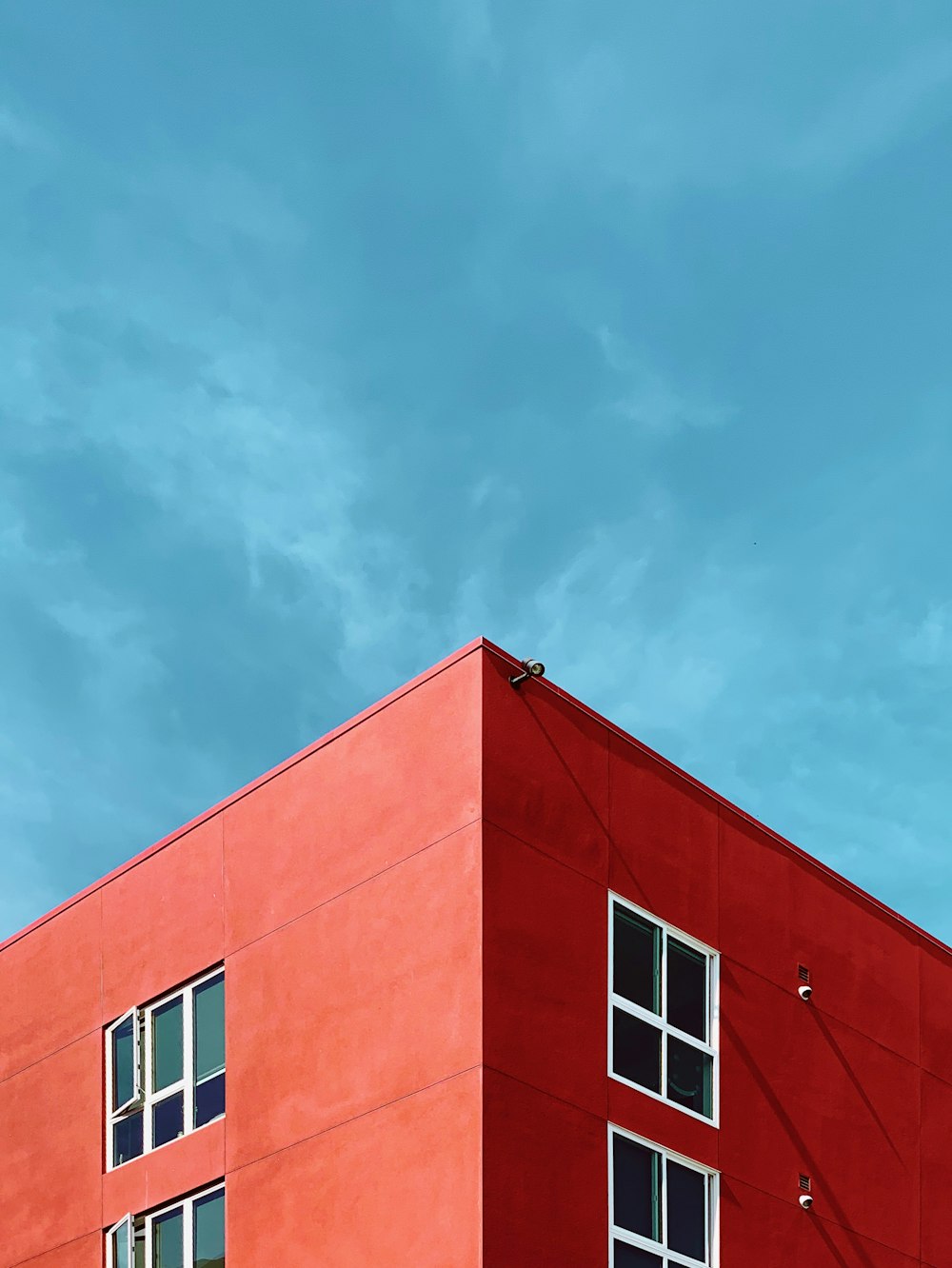 photo of rooftop of red building