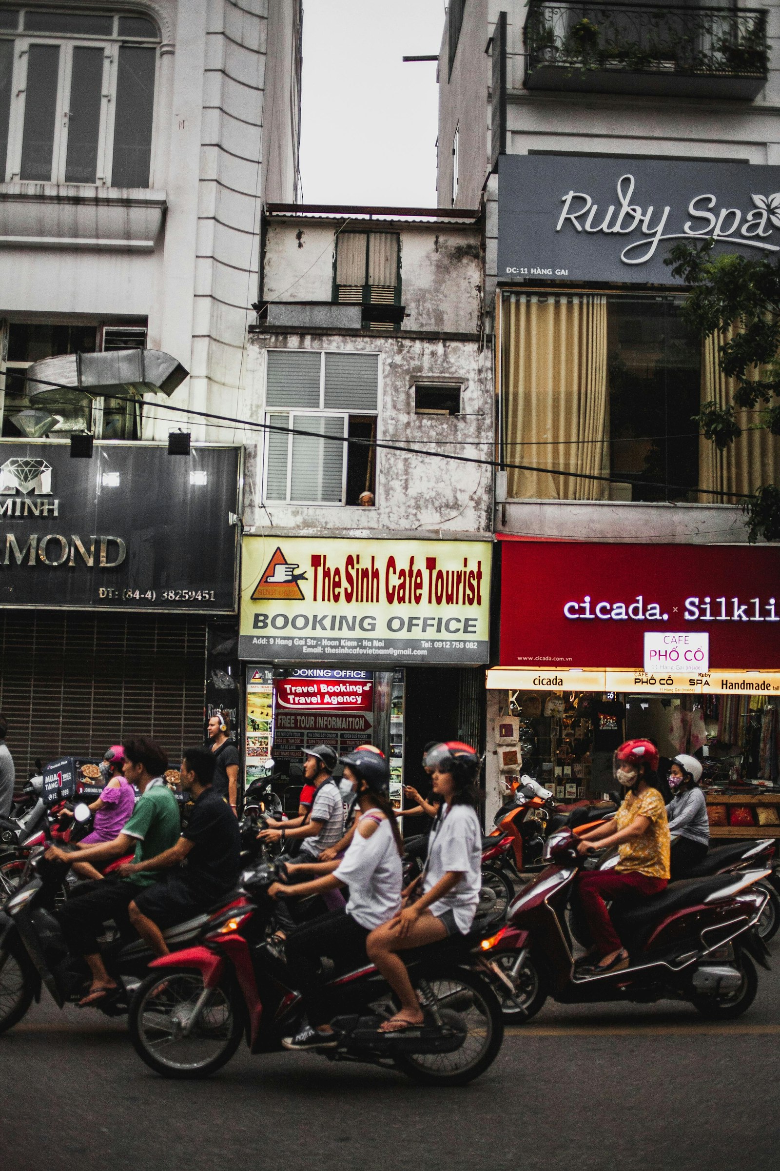 Canon EF 35mm F2 sample photo. People riding motorcycle during photography