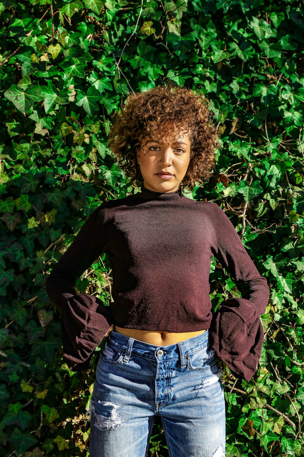 woman in maroon sweatshirt