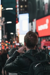 A journalist taking notes in a bustling urban environment, capturing stories.