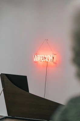 A small orange color board featuring its name below.