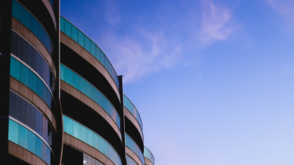 high-rise glass building during daytime