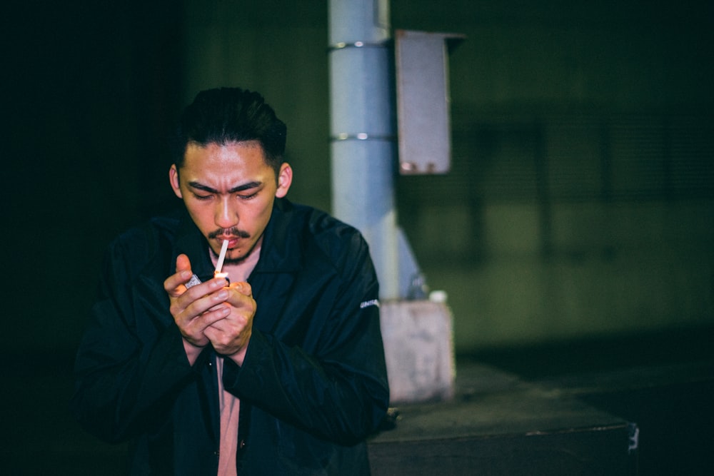 man smoking cigarette