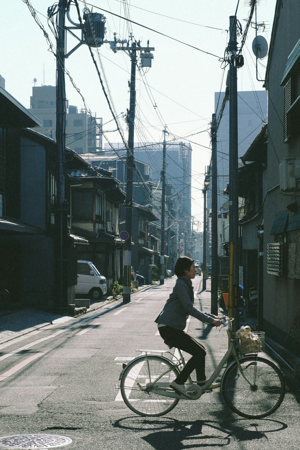 woman riding bicycle during daytime