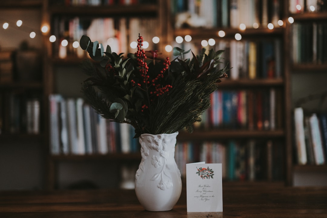 green plant in vase on table