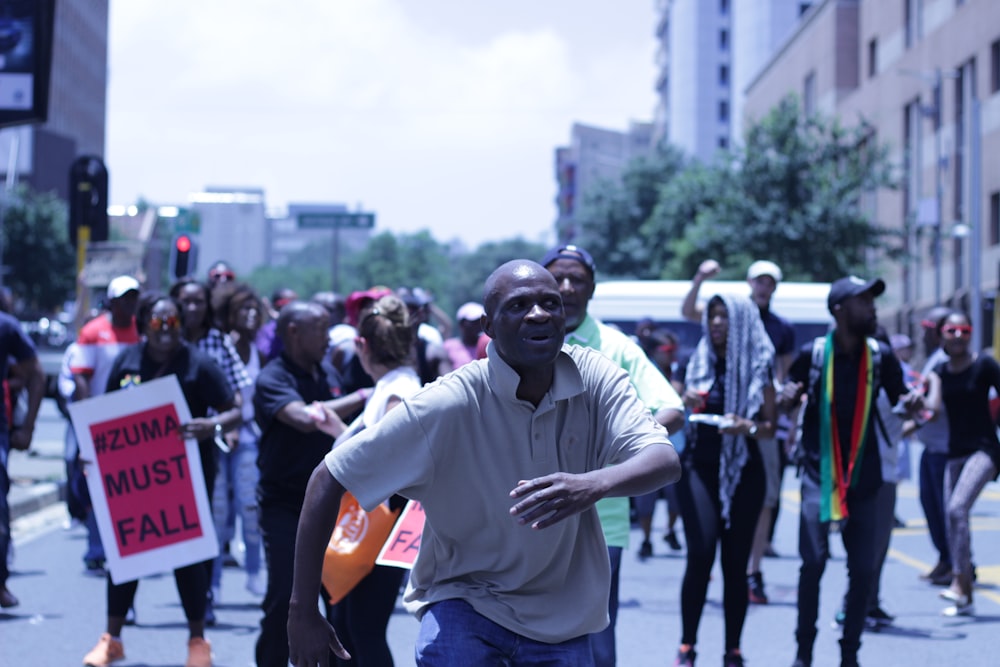 group of people on road during daytime