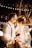 man kissing woman's forehead