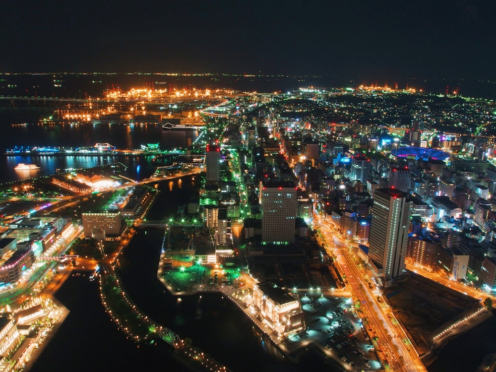 aerial photography of city buildings at night time