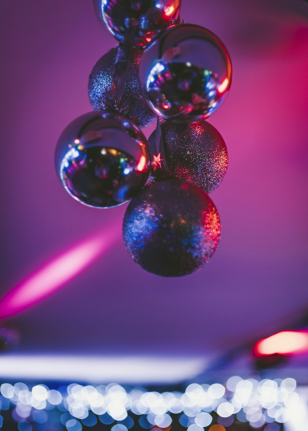 hanging baubles near LED lights