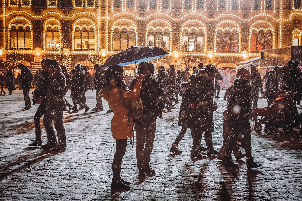 woman holding umbrella