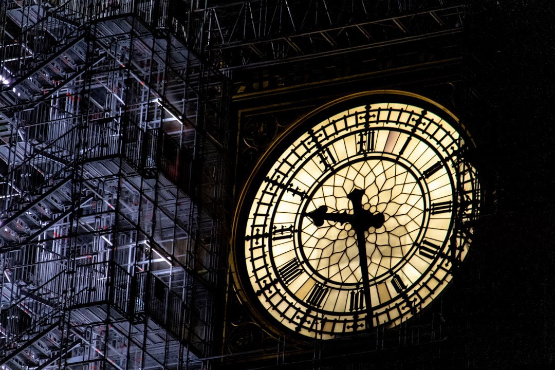 black clock, You won’t see this sight for too much longer. The iconic clock, which is situated in the Elizabeth Tower, is widely known as Big Ben, however, Big Ben is actually the bell, not the clock or the tower.<p></figure>At present, it is having a clean up and refurbishment. In order for this to be completed, it has lots of scaffolding around it, so the workmen can access it from the outside.</p><p>As you will see, I took this photo at almost 9.30pm and I loved the contrast in light that was illuminating the clock face and the scaffolding to the right of it.