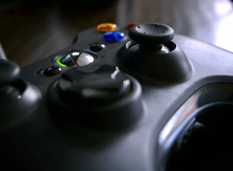 A clean, minimalistic gaming interface with bright orange and green buttons on a white background.