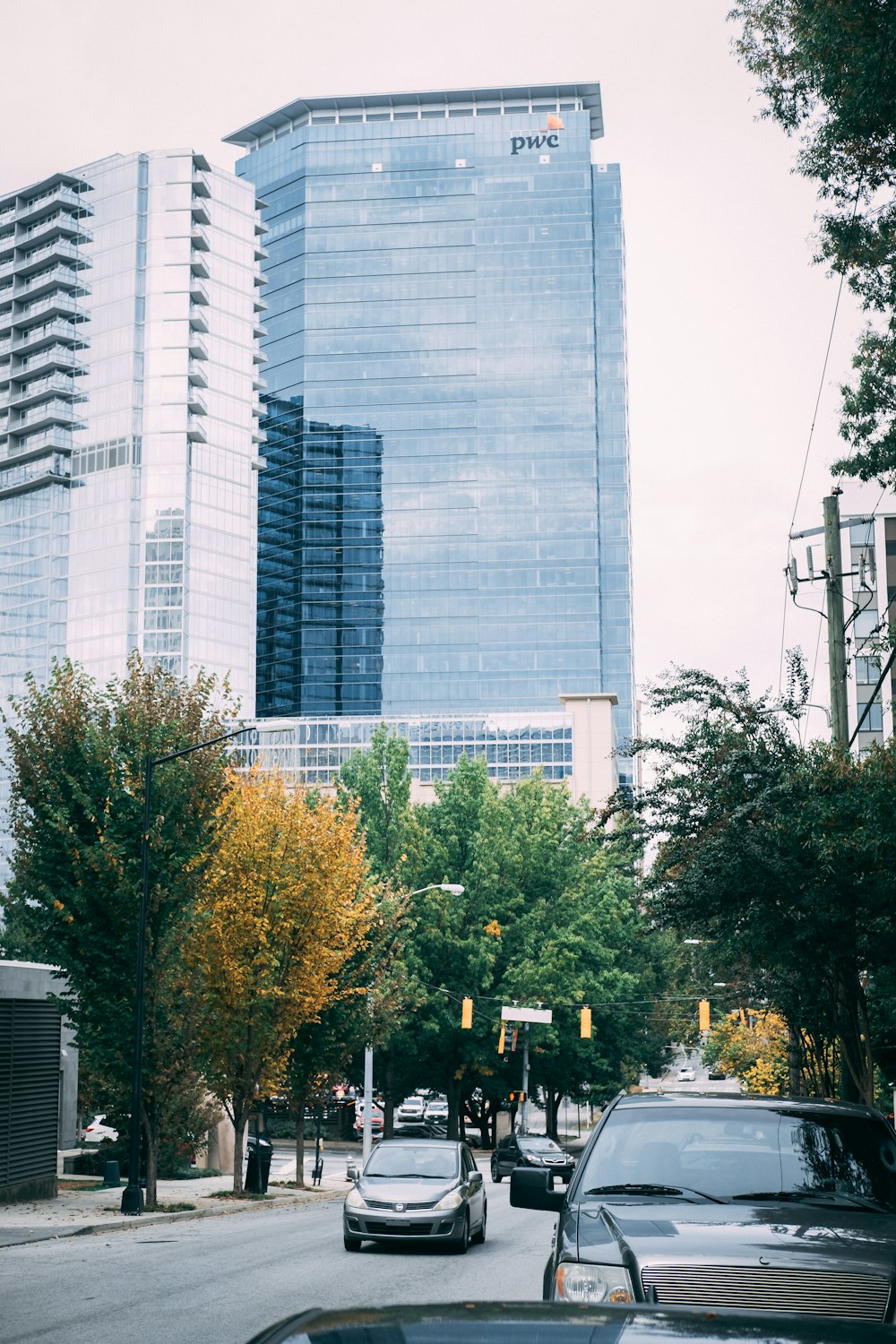 vehicles on road near building