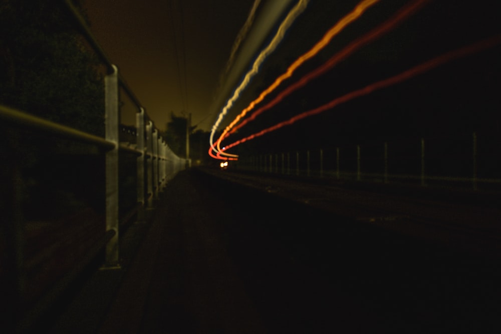 a blurry photo of a street at night