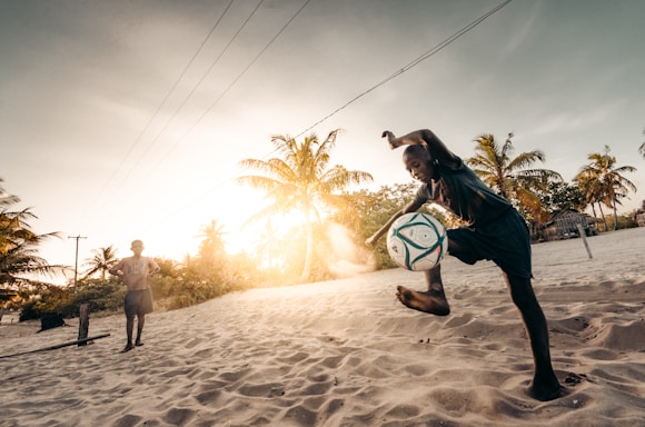 boy playing football