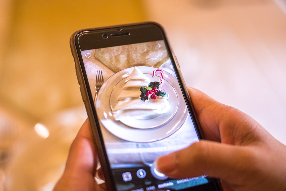 smartphone showing white ceramic saucer