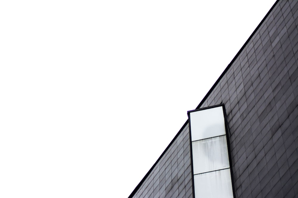 brown wooden window opened on building