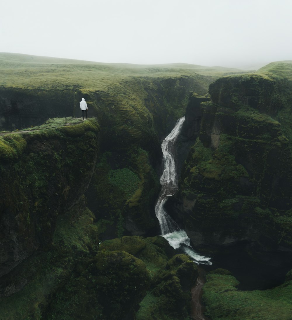 person standing on cliff