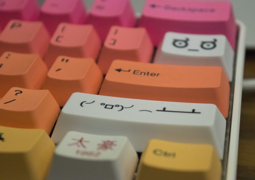 orange and pink computer keyboard