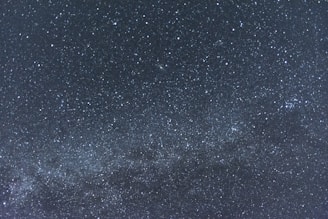 A peaceful horizon under a vast star-filled sky, suggesting the limitless possibilities of personal growth.