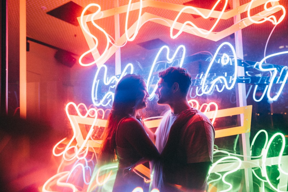 selective focus photography of man and woman about to kiss