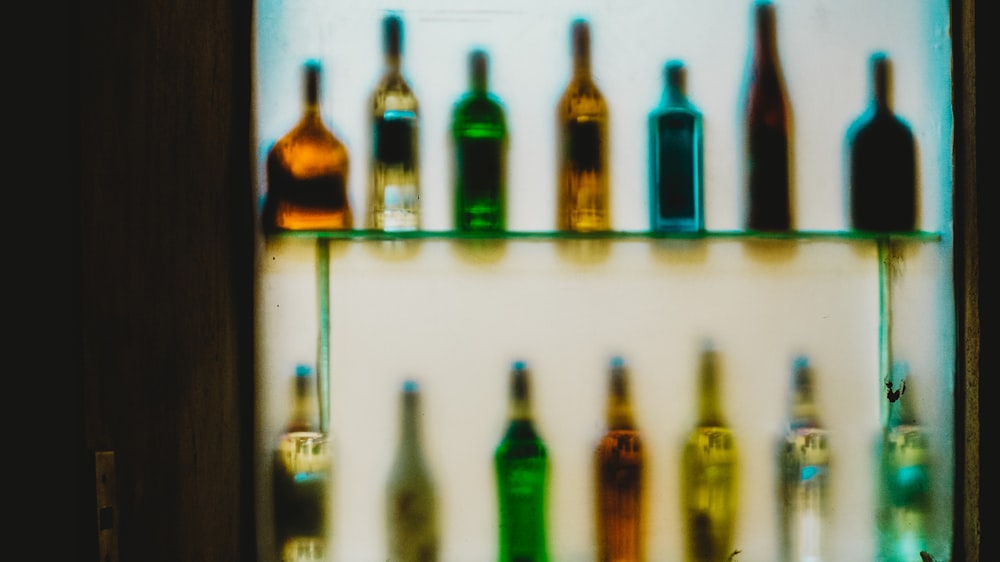 glass bottles on shelves