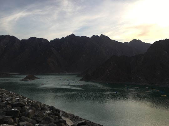river surrounded by mountains in Hatta Hill Park United Arab Emirates