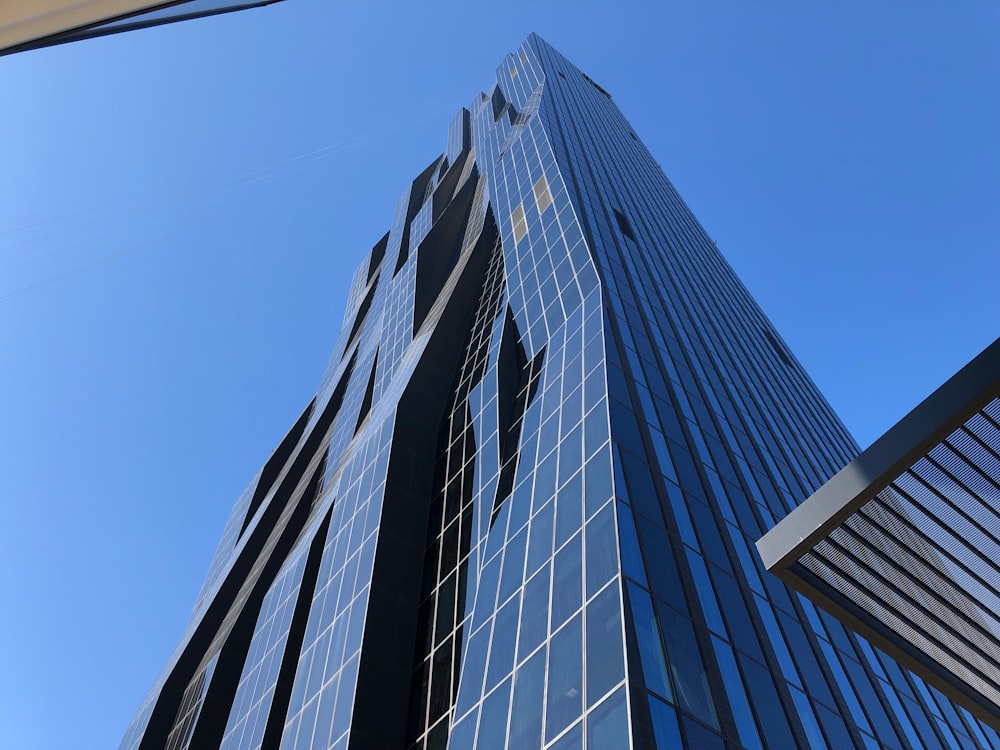 low angle photography of glass walled high rise building