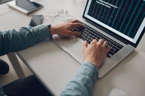 person using Macbook Pro