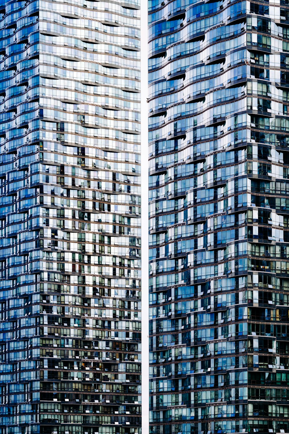 black glass-panel building collage