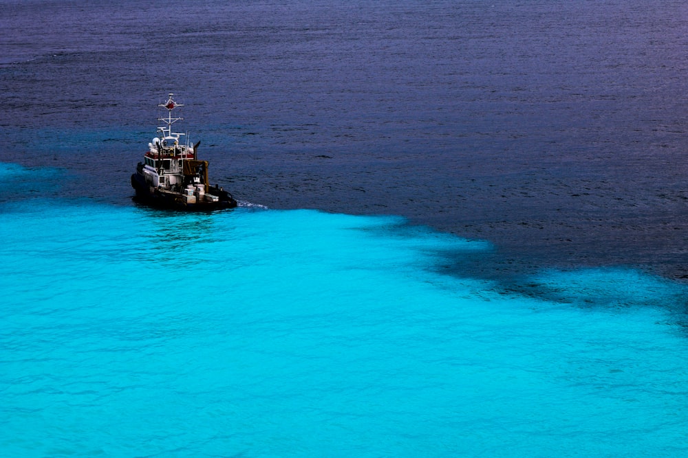 person riding on the boat photography