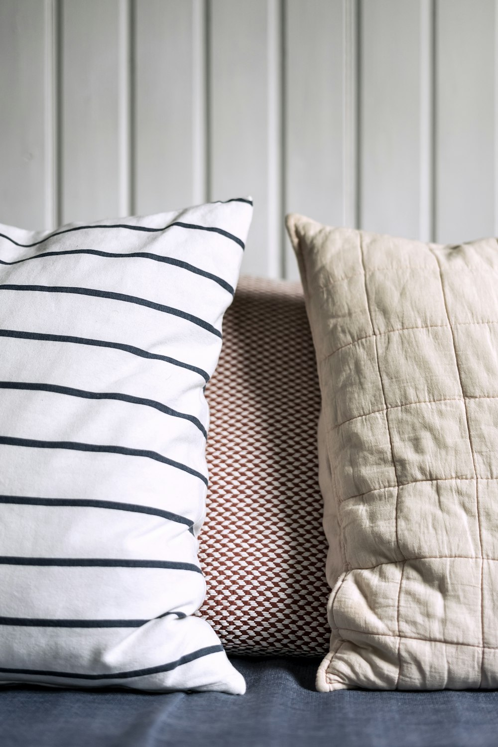 two white and gray throw pillows