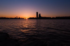 A vibrant sunset view over a famous city skyline captured during a Riva Travel tour.