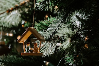 The Nativity of Christ-themed wooden Christmas ornament