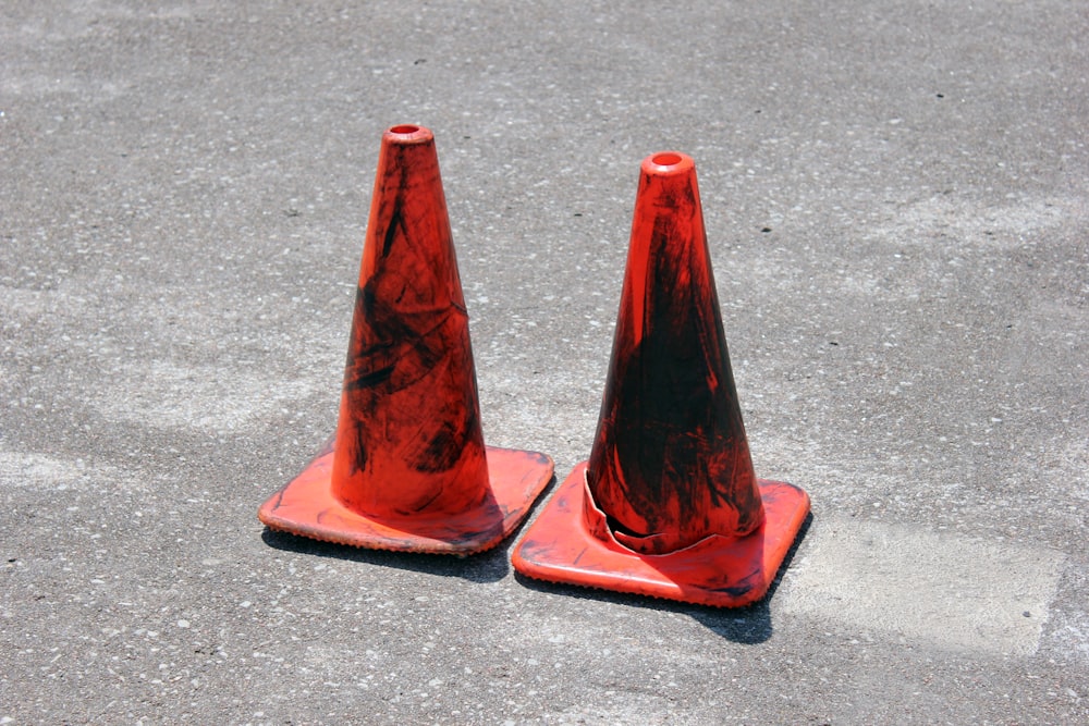 two red traffic cones