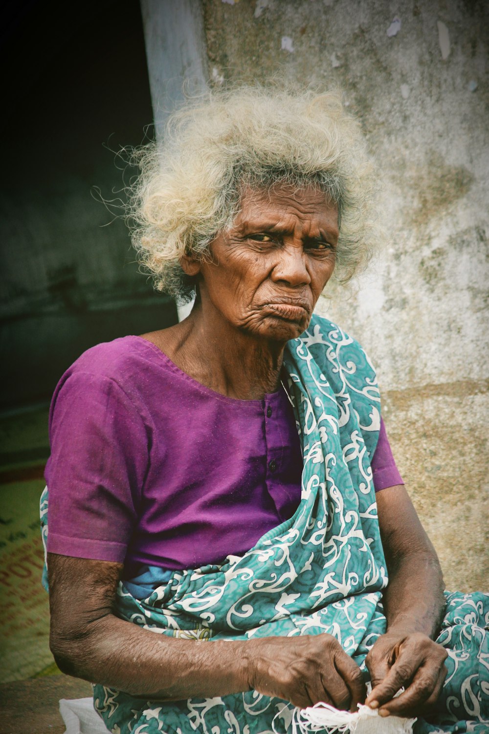 woman wearing purple shirt