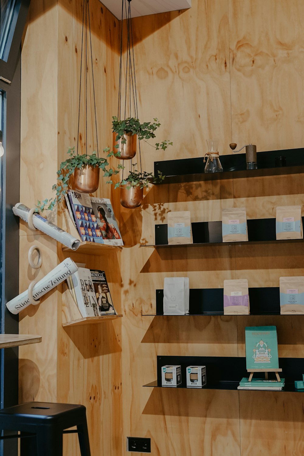 hanging plant pots near floating shelves