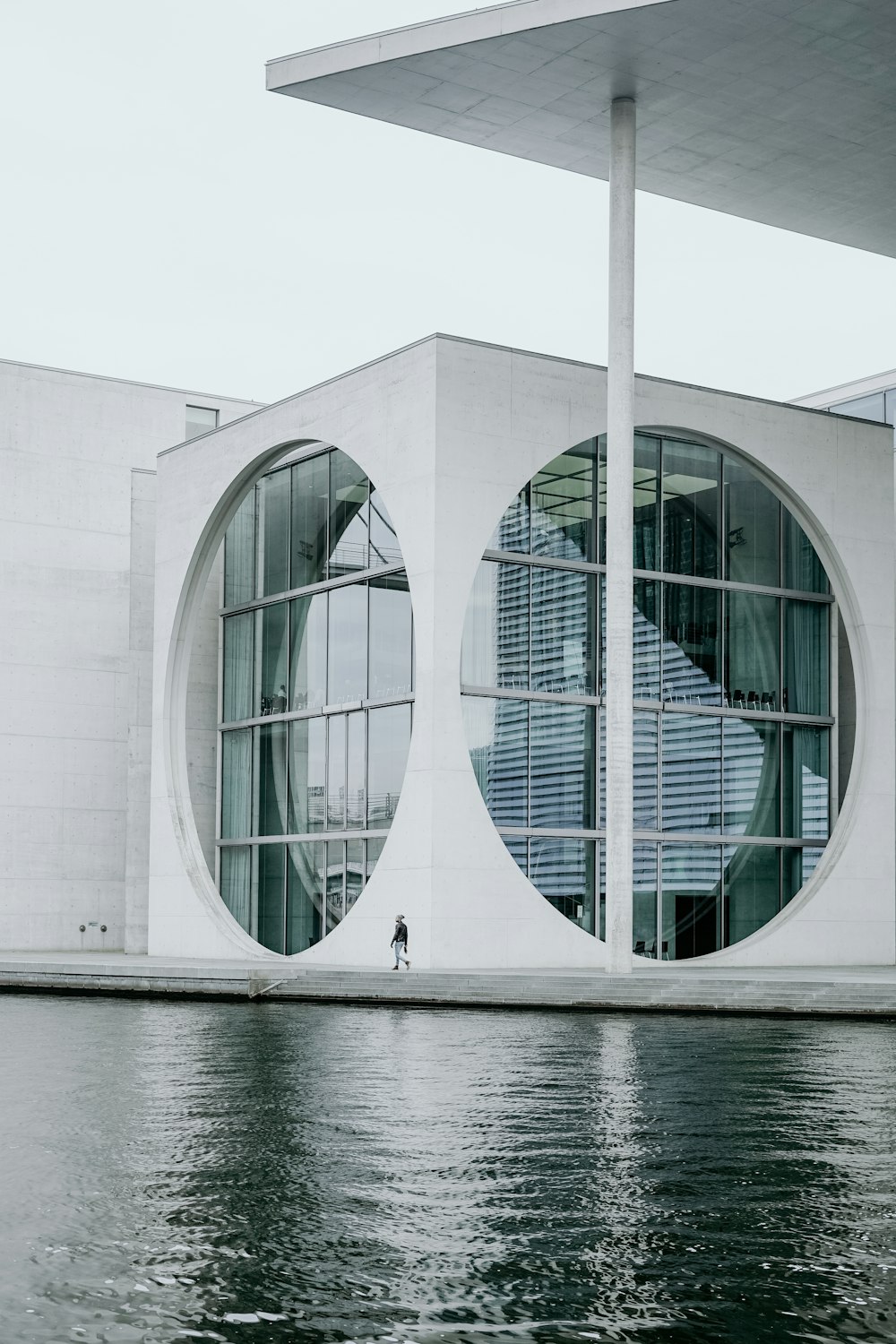 white wooden glass walled building