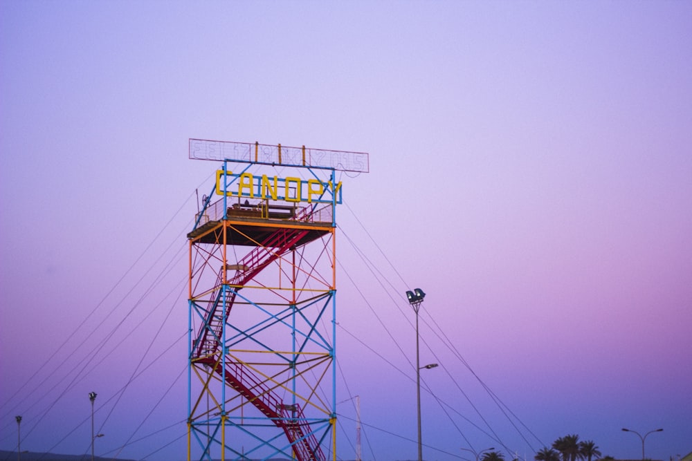 red and multicolored metal stand