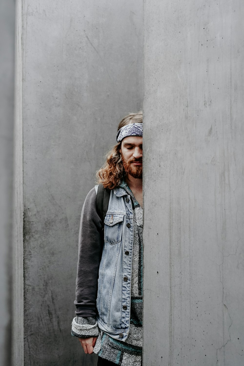 man in blue denim jacket