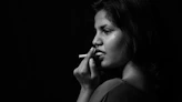 woman using cigarette