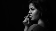 woman using cigarette