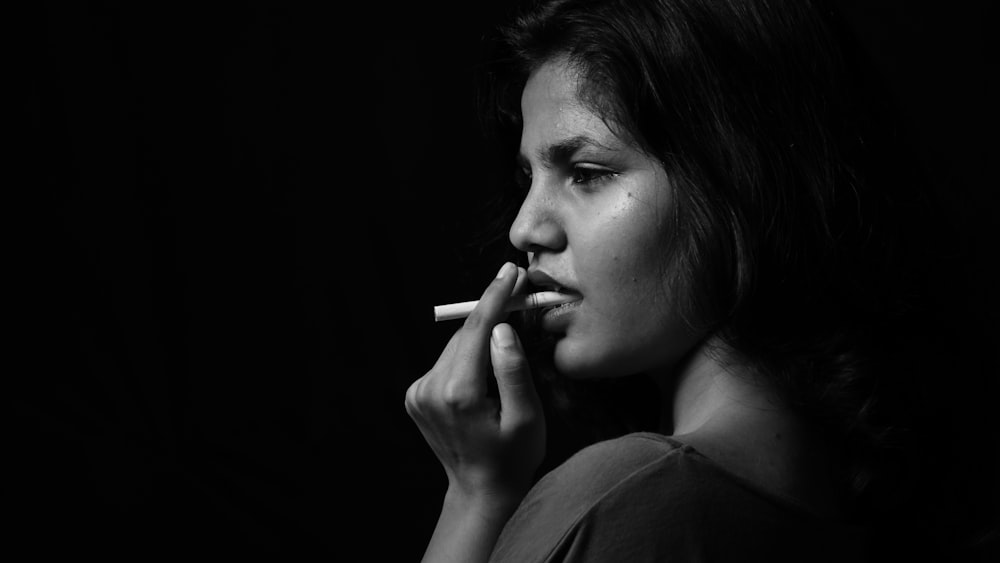 woman using cigarette