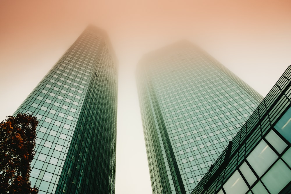 low-angle photo of high-rise buildings