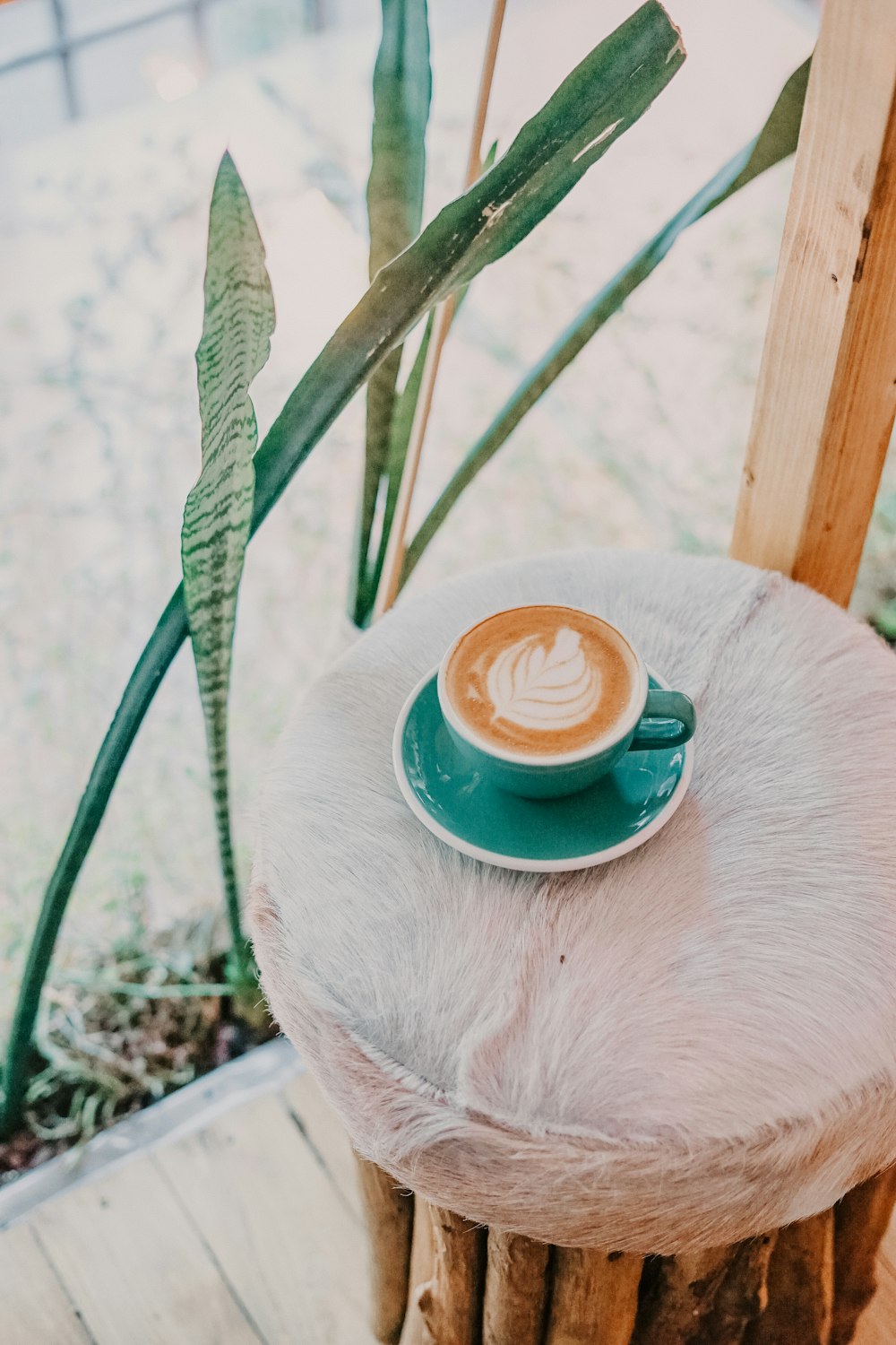 lattee in green ceramic mug