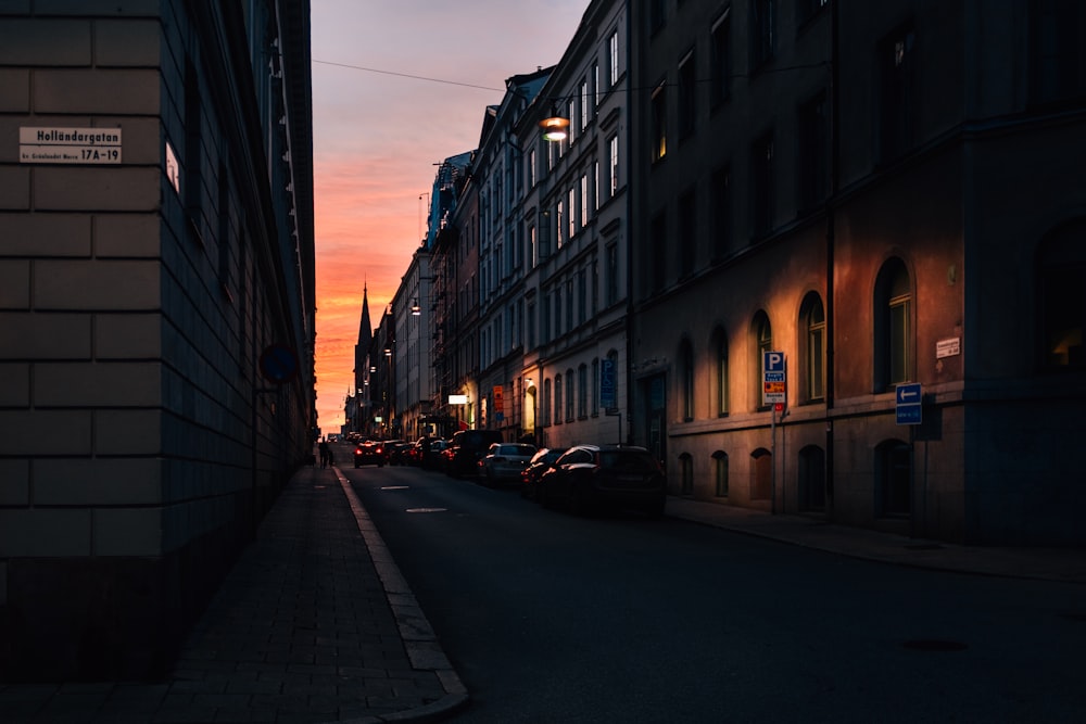 cars parked near building during nighttime