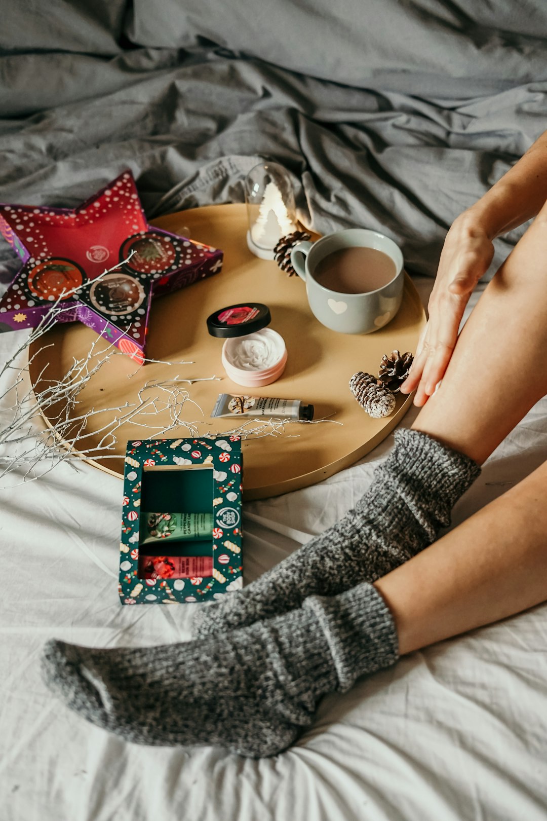 essentials and cup of coffee on tray