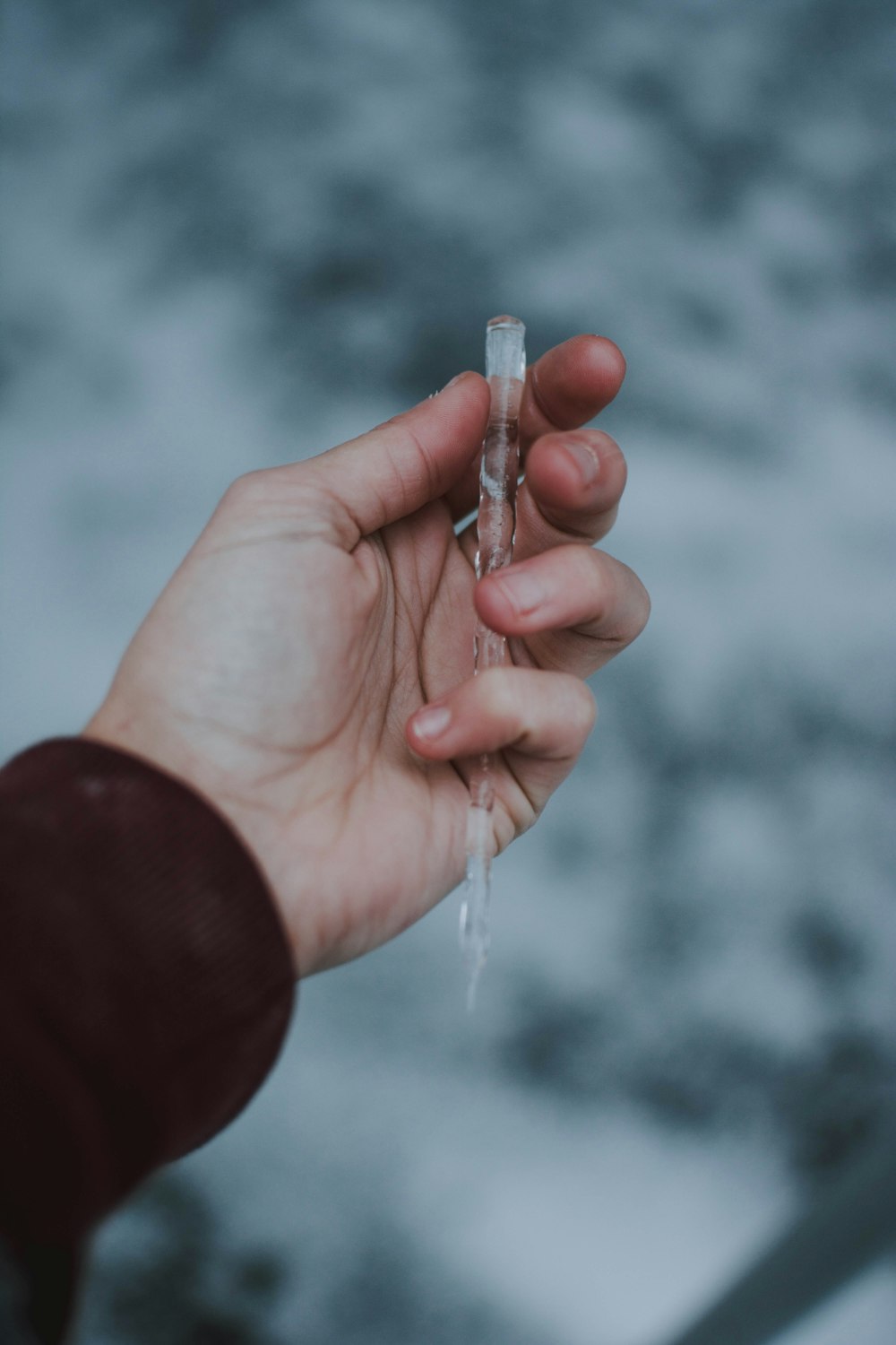 person holding ice