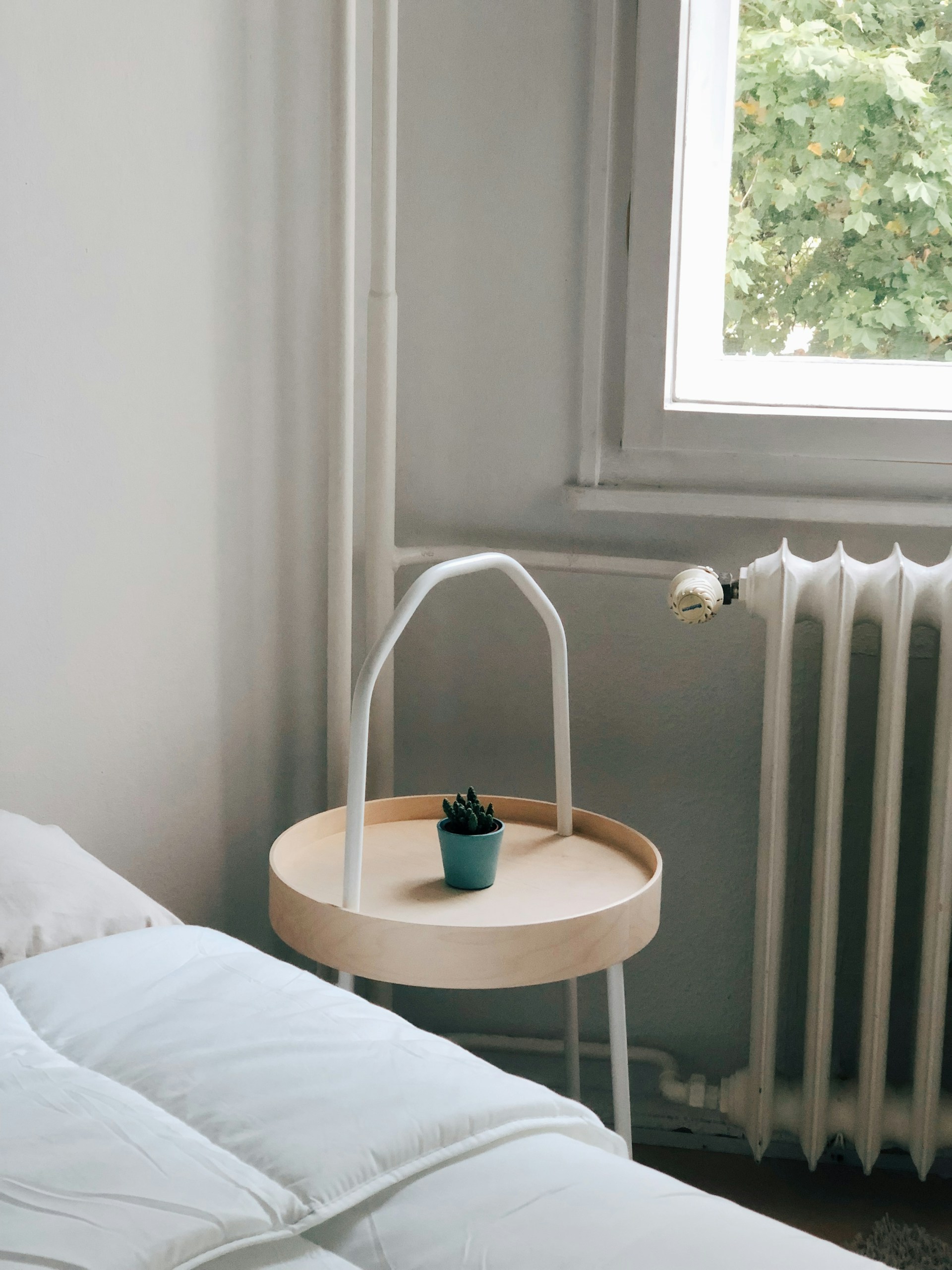 woman wearing yellow long-sleeved dress under white clouds and blue sky during daytime
