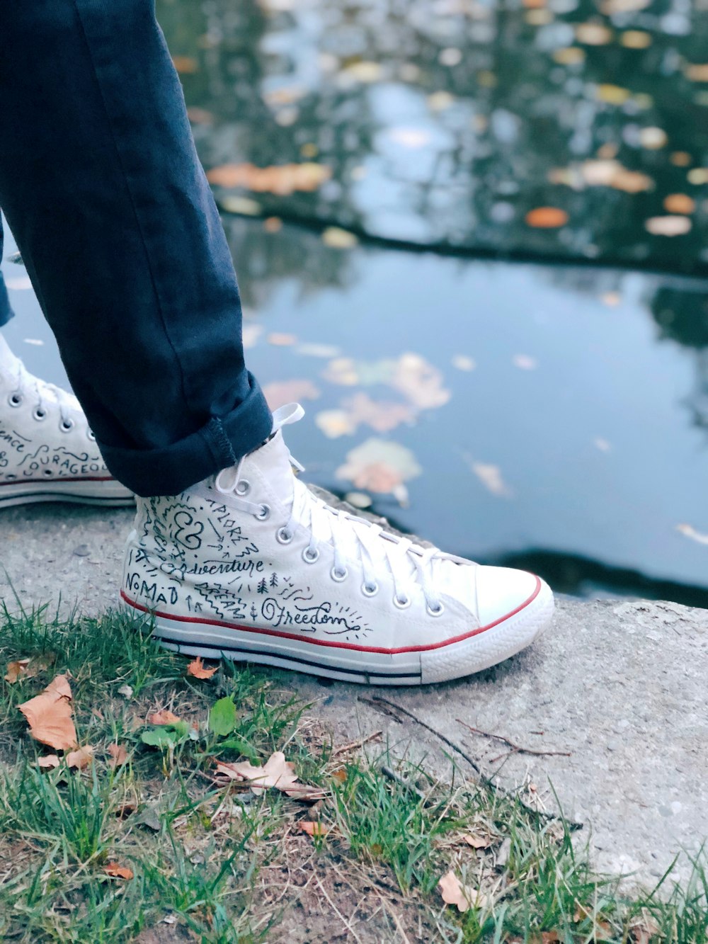 person wearing pair of black VANS Authentic shoes photo – Free Grey Image  on Unsplash
